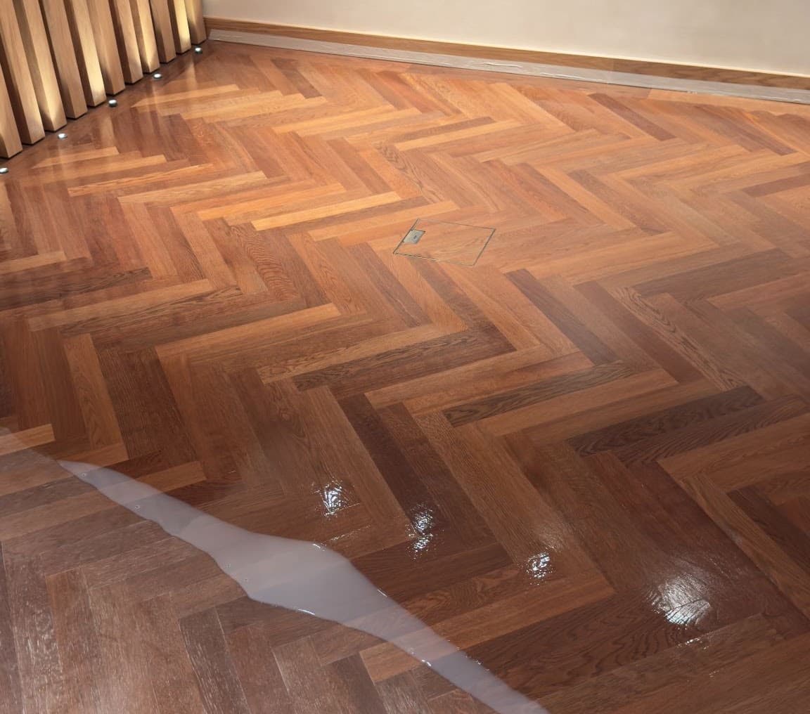 Restored light oak herringbone parquet flooring